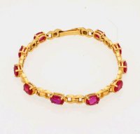 Armreif 585 Gelbgold mit 25,4 ct Rubinen - Bild 1